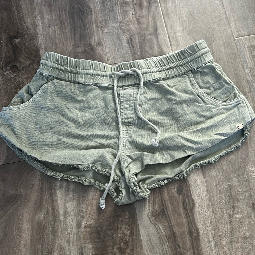 Green beach shorts